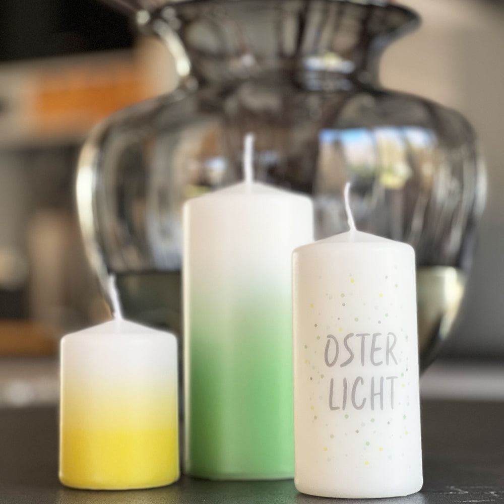 Osterdeko mit Kerzen inm grün - gelb
