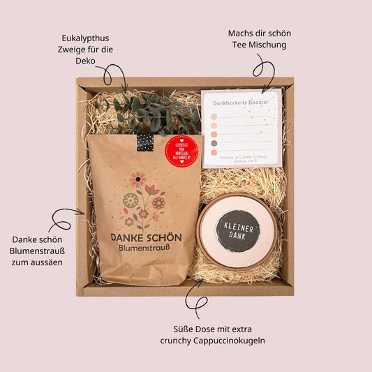 Inhalt der Geschenkbox, Wundertüte, süße Dose und Dankbarkeitsblock