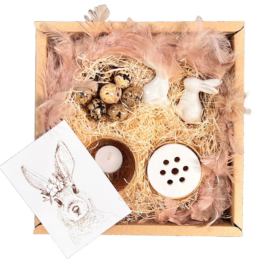 Osternest Tischdekoration mit Hasen und Federn