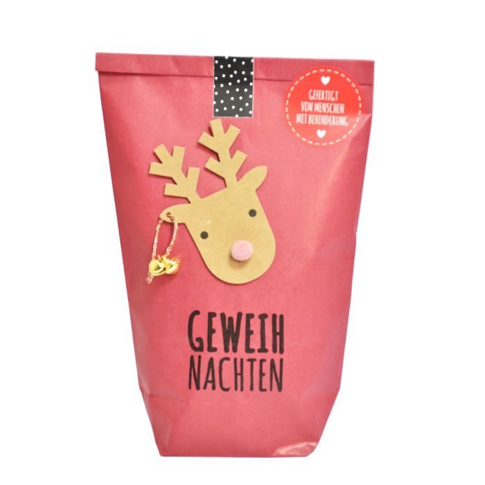 Wundertüte in rot mit Elch drauf und Geweihnachten bestempelt als lustiges weihnachtsgeschenk