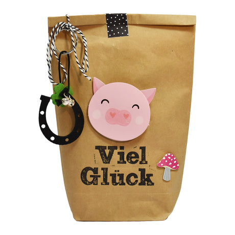 Wundertüte in braun mit Schweinchen und Pilz als viel glück geschenk